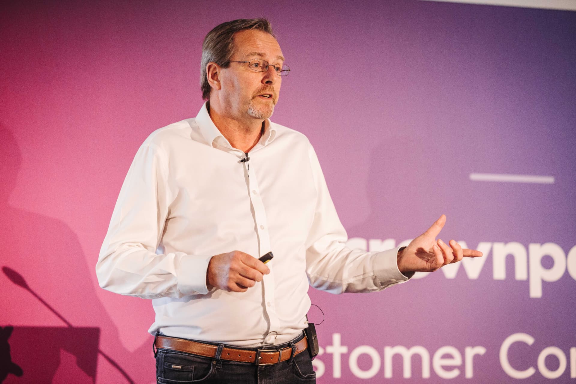 Andrew Busby delivering a keynote at a Crownpeak event